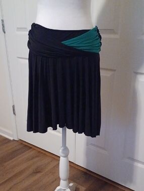 <> BCBGirls Black Mini Skirt with Teal Accent